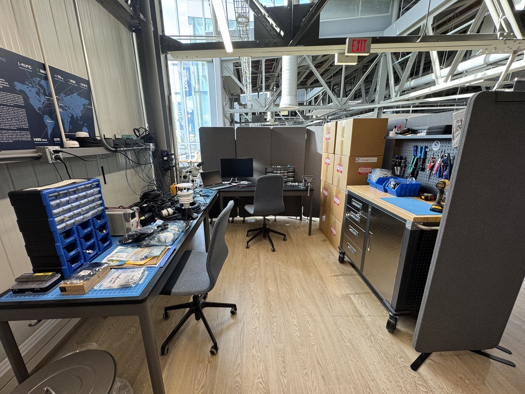 OceanSync workshop at The PIER, Halifax, with assembly benches, tools and boxed gateways